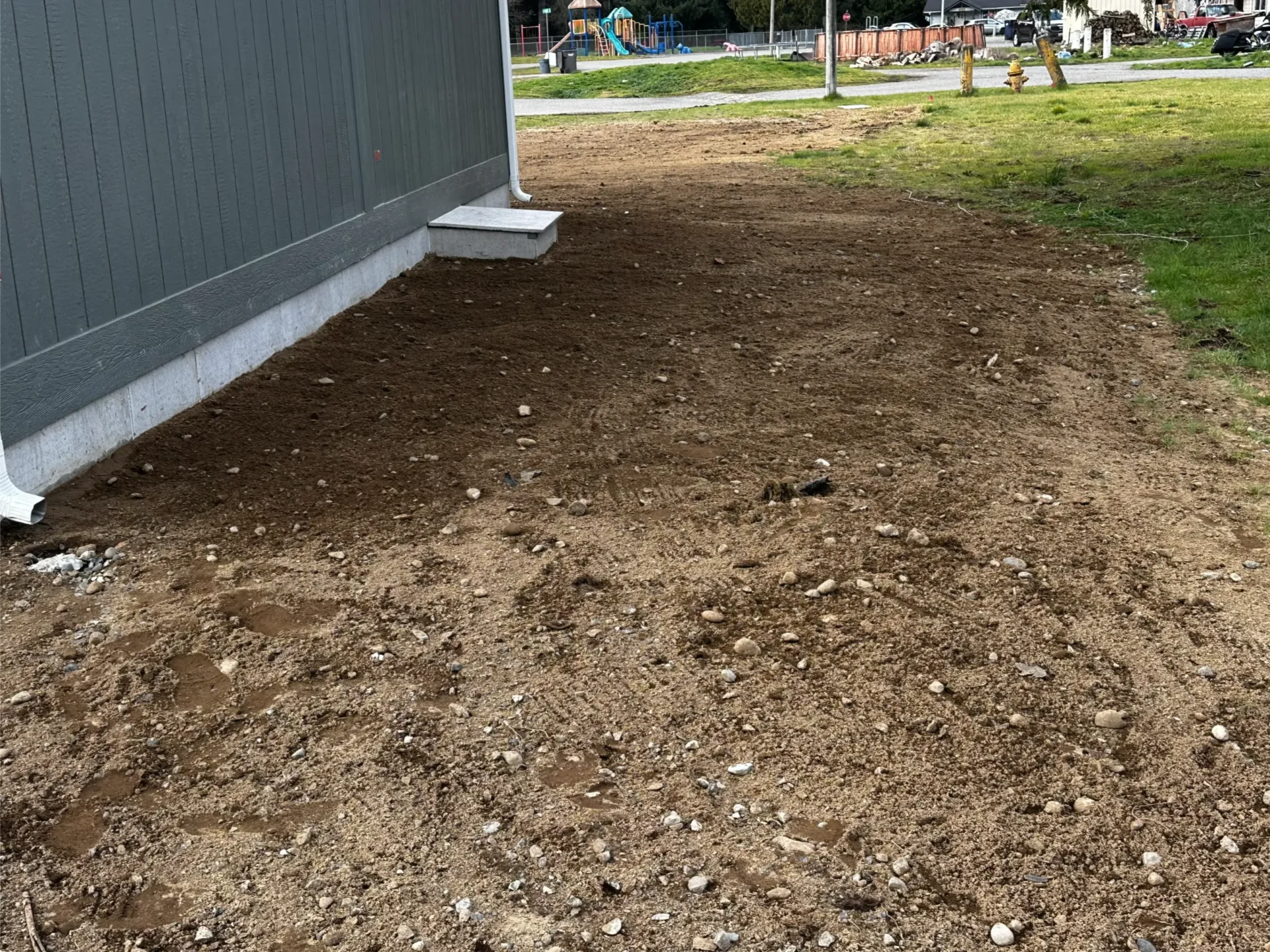 manufactured-home-final-grading-drainage-slope-downspout